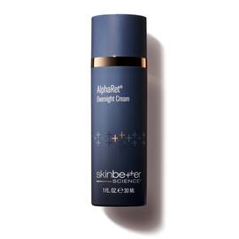 AlphaRet Overnight Cream in a navy blue airless pump bottle with a gold band, shown on a white background.