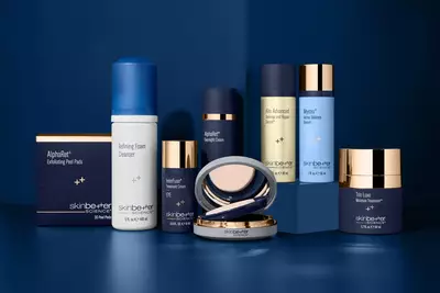 Seven skinbetter science products against a deep navy backdrop