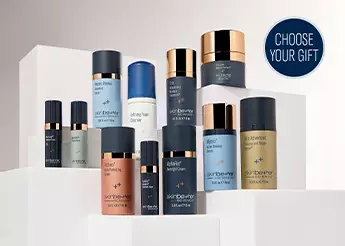 Assortment of skinbetter's most popular products in deluxe sizes, on a shelf with soft cream color background