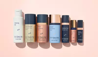 6 skinbetter science products posed against a gold background
