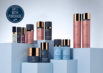 Assortment of skinbetter's most popular products for the Skincare Stockup in deluxe sizes, on a shelf with soft blue color background