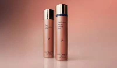 Even Intensive Skin Soothing Serum products side by side on a peach-toned gradient background