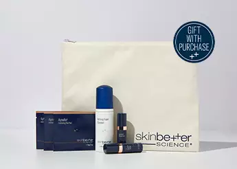 gift with purchase - gray background with an assortment of three products and one bag