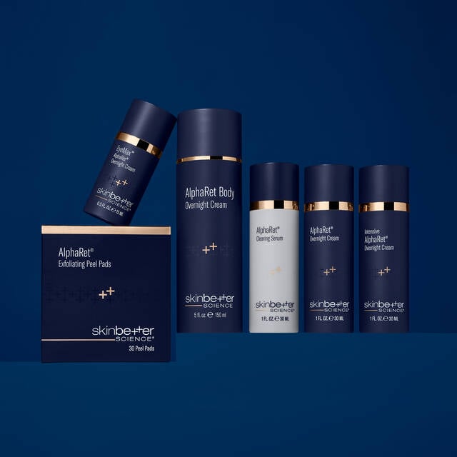 AlphaRet collection stacked horizontally on a dark blue surface