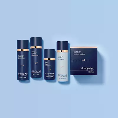Three skinbetter science products lined up horizontally on a pale grey surface